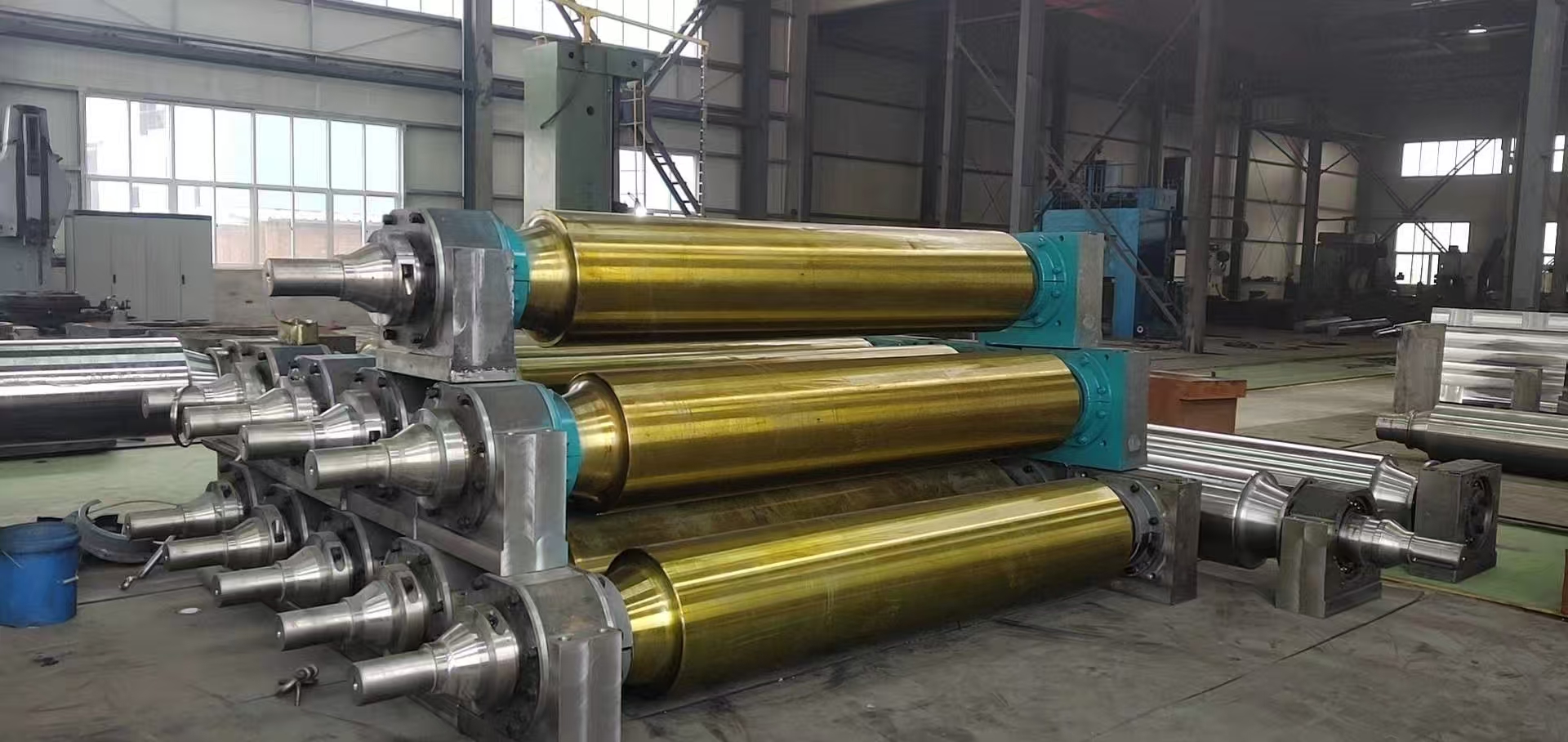 W jakich zastosowaniach wykorzystuje się przede wszystkim elementy przenośników rolkowych ślizgowych?